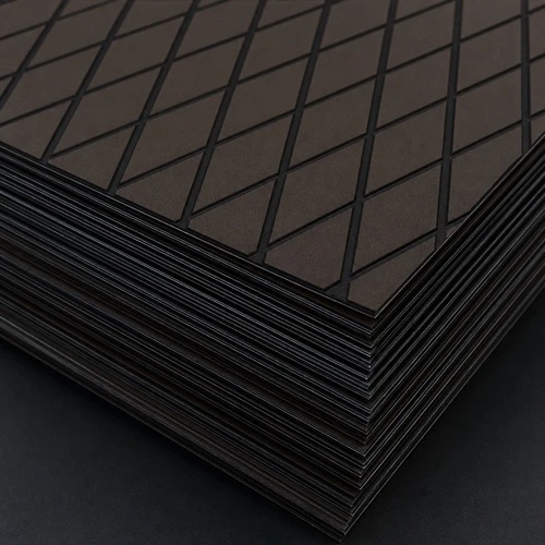 Stacked dark brown diamond-pattern marine flooring sheets with black grooves.